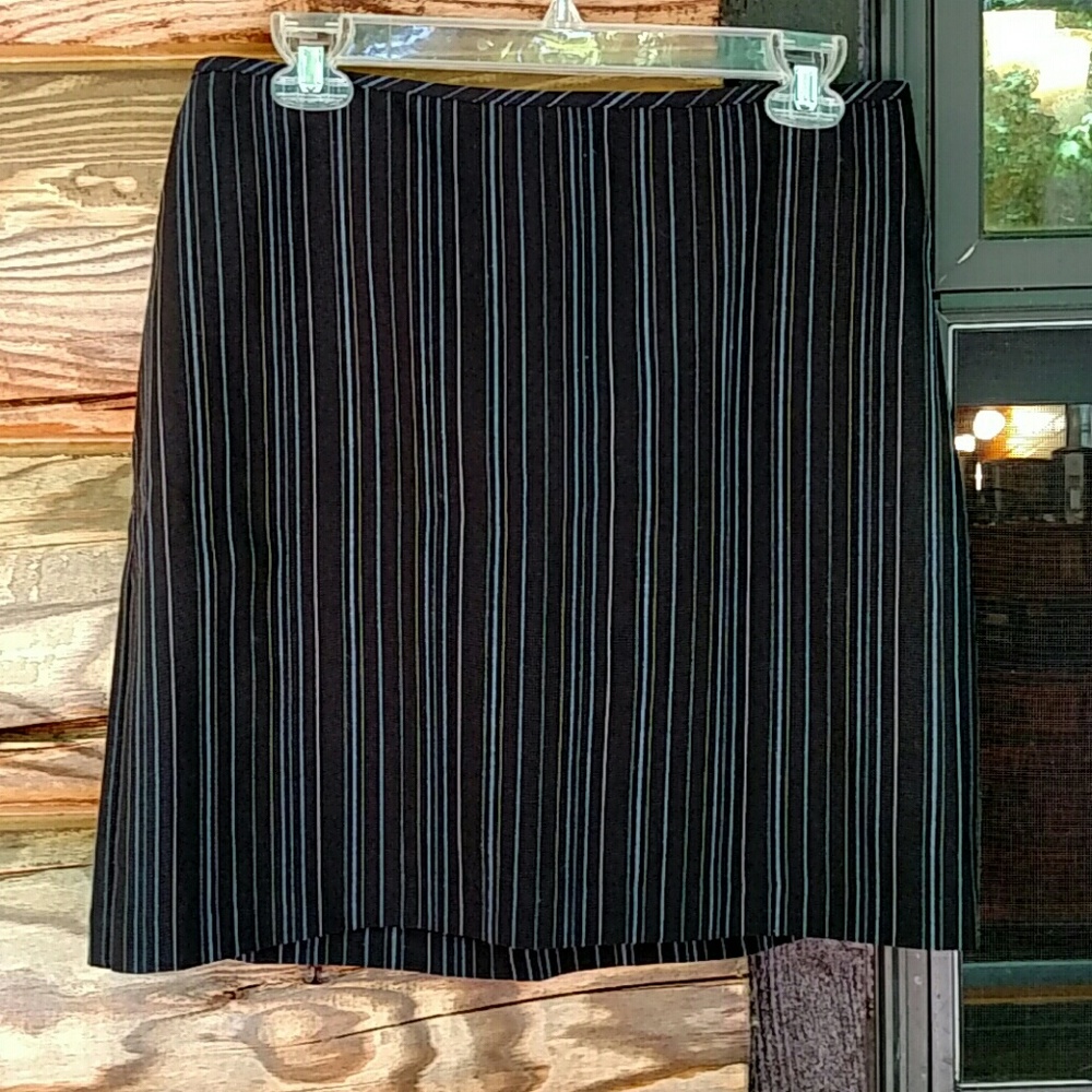 Black skirt with light blue and cream stripes.9/10